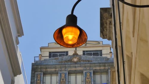 Orange street light in an alley