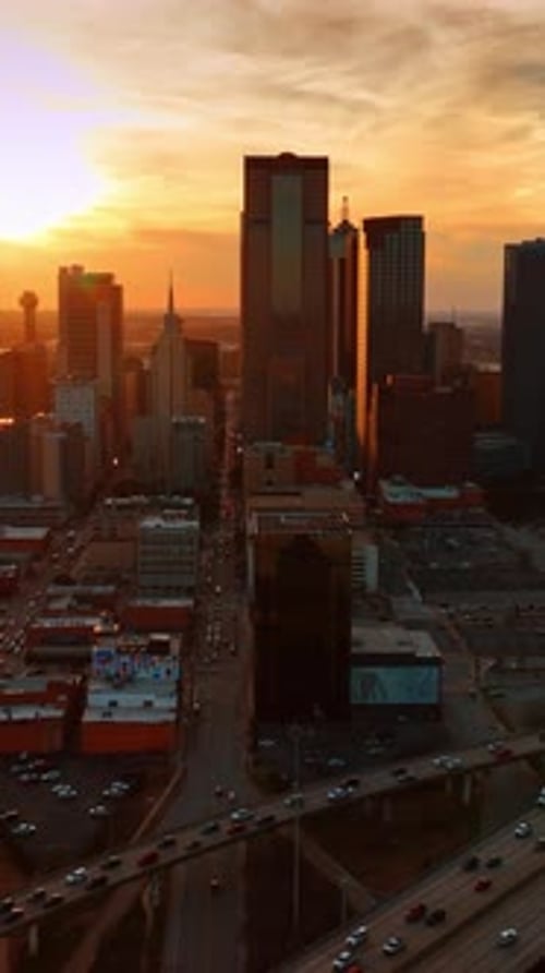 Beautiful golden hour in the modern city. Aerial view of Dallas, Texas, USA at sunset from top.