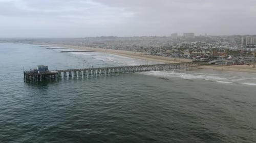 Aerial Drone Shot of Newport Beach Pier, Ocean and City - Parallax - 4K UHD