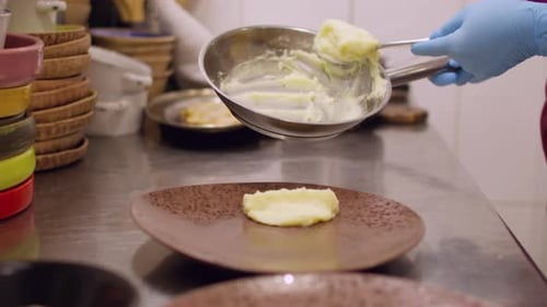 Preparing Mashed Potatoes in Professional Kitchen for Meal