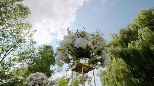 Elegant Floral Arrangement for Outdoor Wedding Ceremony