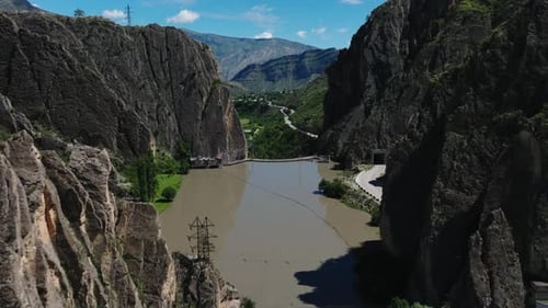 A River Flows Between Two Mountains