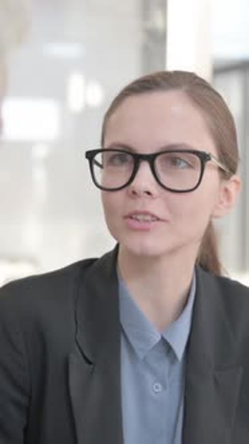 Close Up of Businesswoman Talking with Businessman, vertical video