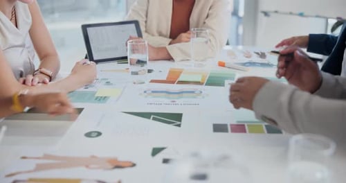 Adults Brainstorming Together in a Corporate Workplace Meeting