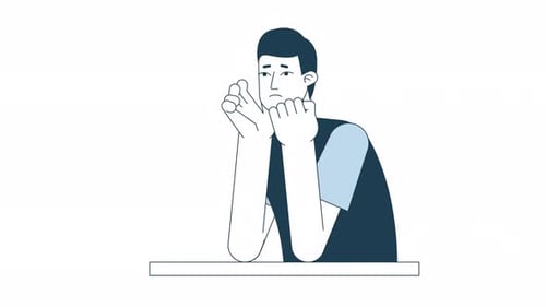 Joven triste animado en el escritorio