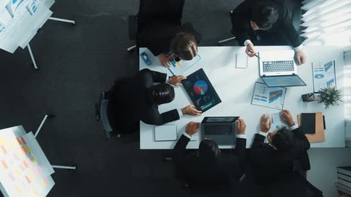 Top view of businesswoman bring statistic graph during meeting. Directorate.