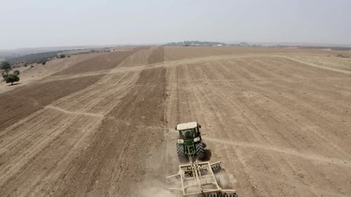 Tractor tilling in Judea Plain, Drone footage, Israel
