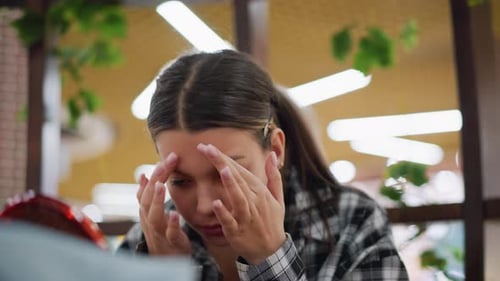 Closeup View of Young Girl Applying Makeup with Hands for Smooth Finish