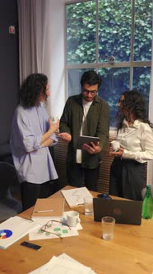 Diverse Business People Working Together on Creative Project in Modern Office