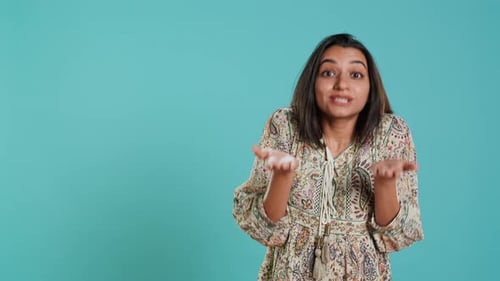Young Woman Shrugging Shoulders with Confused Expressions