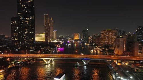 Skyscrapers in Bangkok City and River at Night