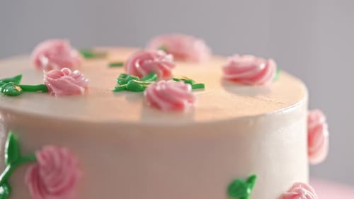 Elegant Rotating Cakepink Buttercream Flowers on White Frosting Bakery Pastry