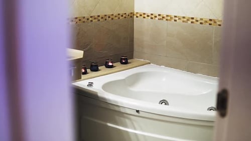 Jacuzzi Tub with Candles in Bathroom