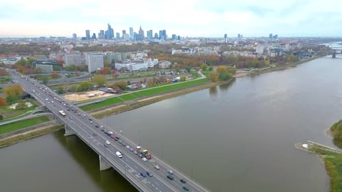 Aerial panorama of Warsaw, Poland at sunrise including Swietokrzyski Bridge over the Vistual river a