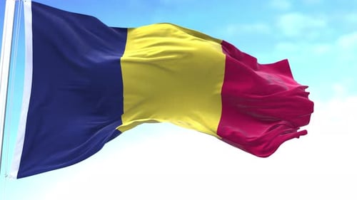 Realistic Waving Flag of Chad and Romania Against Blue Sky