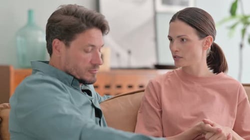 Close up of Woman Fighting with Tense Husband at Home