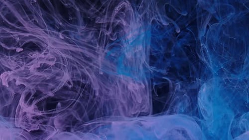 Abstract Plumes of Light Blue and Purple Smoke