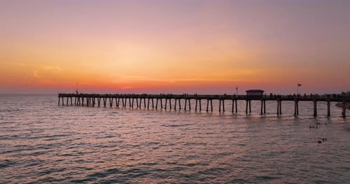 Venice Florida People Enjoying Bright Sunset on Fishing Pier Seaside Summer Activities on Fresh Air
