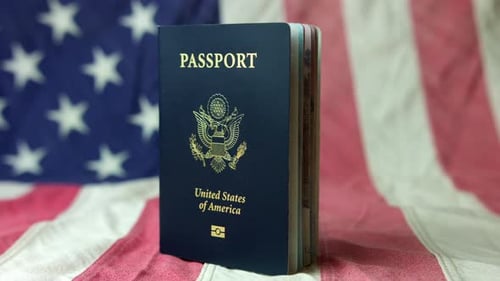 American Passport on American Flag