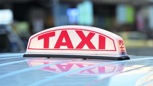 Hong Kong Taxi Sign Close-up Illuminated Detail Urban Public Transport City Branding Lifestyle
