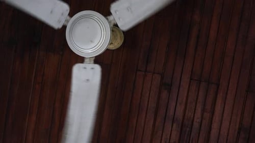 Close Up of Ceiling Fan Spinning