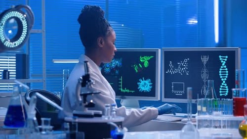 Female Scientist Working Diligently in Modern Lab
