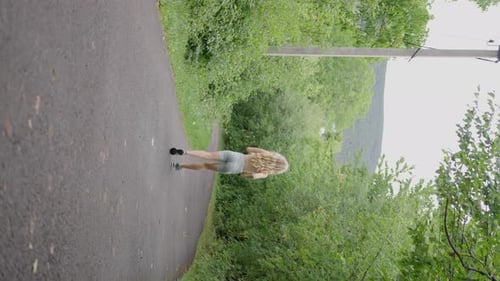 Adult Girl Athlete Long Hair on a Morning Jog Running in the Forest