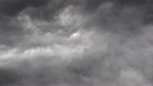 view of thunderstorm dark clouds and dark sky.