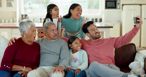 Large Family Poses for Fun Selfie at Home