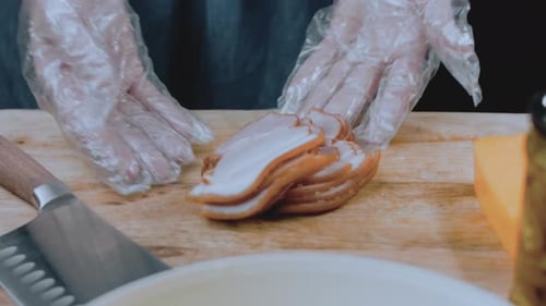 Meat Slices Placed on Cutting Board
