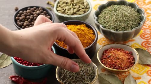 Colorful Assortment of Spices in Bowls Arranged Neatly