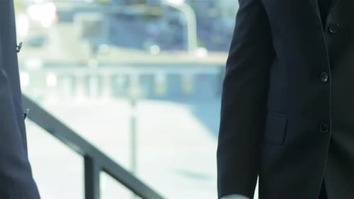 Business Handshake in Office Environment