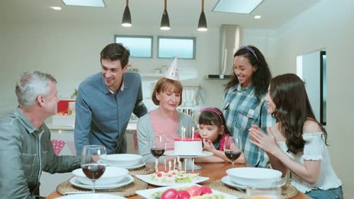 Family Celebrates Birthday Party Together at Home