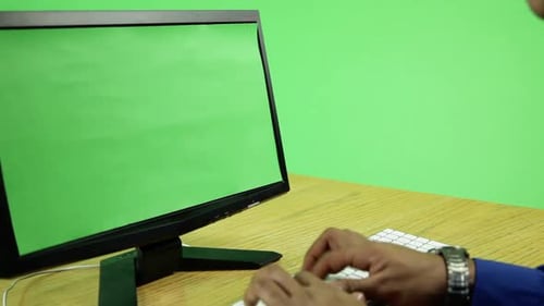 business man with computer and copy space on green screen