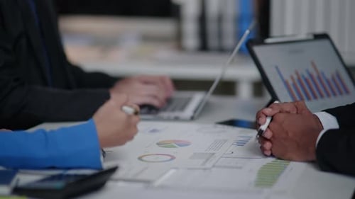 Close up of hands teamwork business group working and brainstorming on business