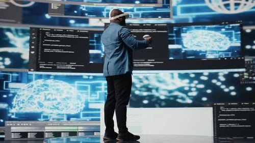 Digital Tech Expert Coding and Using VR Headset at Innovation Hub