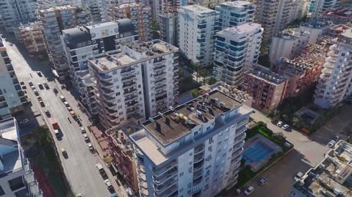Aerial Video of a Stunning City Panorama With HighRise Buildings Busy Streets and a Clear Blue Sky
