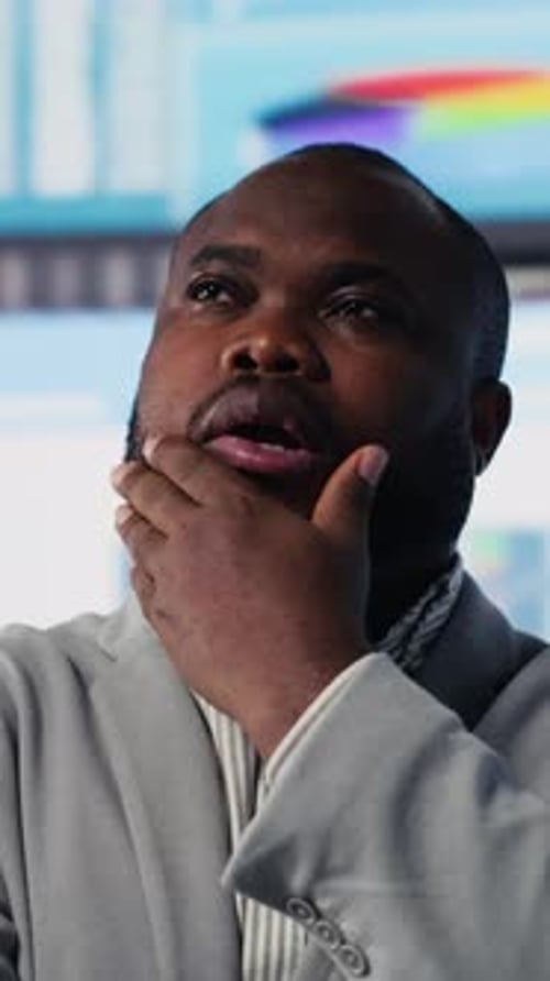 Vertical Video Black Startup Administrator Thinking About New Successful Ideas