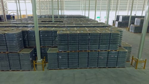 Industrial Warehouse with Massive Stacks of Managed Inventory and Logistics