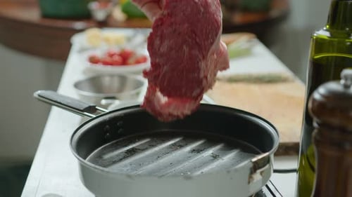 Frying Meat Steak on Grill Pan