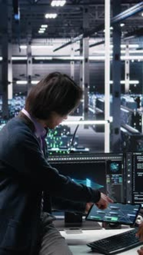 Vertical Video Multiracial Technicians in Diverse Data Center Review AI Diagnostics