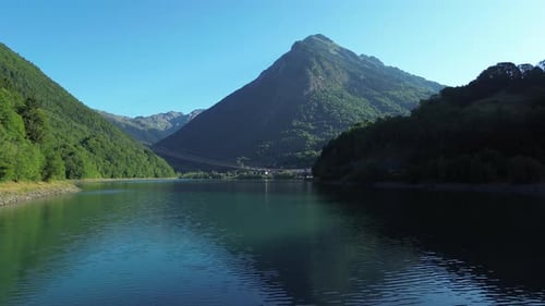 Aerial panoramic view of alpine lake and mountains in the French Alps - breathtaking scenery