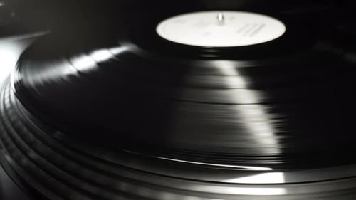 Segmente einer Schallplatte, die sich dreht, Makro-Ansicht, Musik abspielen, Makro-LP-Loop
