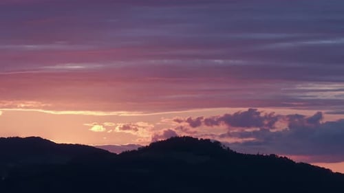 Aerial view of landscape with golden sunset after rainstorm with clouds.Close up shot