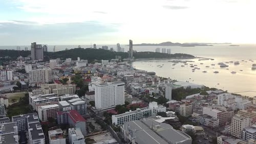 The Stunning Scenery Of Gorgeous Buildings With Calm Sea - Aerial Shot