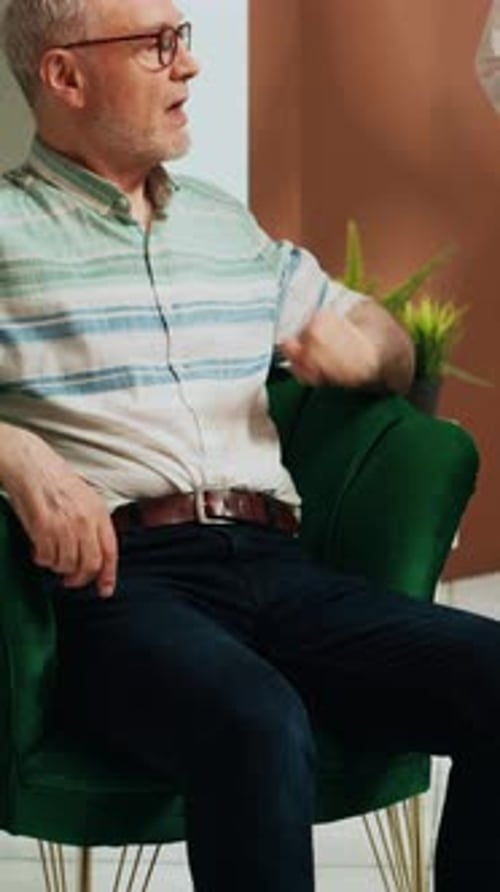 Vertical Video Senior Man Drinking Cup of Coffee