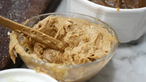 Close Up of Fresh Peanut Butter in a Container