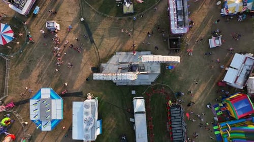 Aerial View of Lively Fairground with Rides