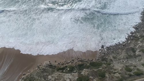 Aerial view of the cliff and wave