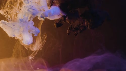 Colorful Ink Paint In Water, Ink Swirling Flow Down Underwater - close up